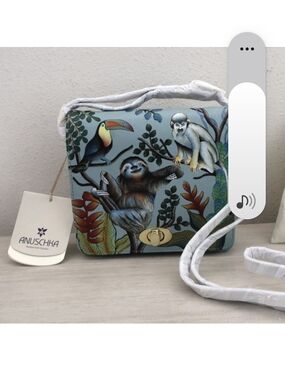 Anuschka Hand-Painted Wildlife Crossbody Bag in Sky Blue.Sloth Bag